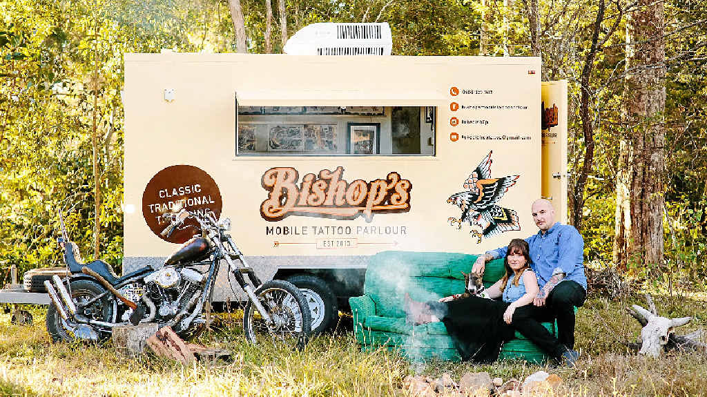 INKING IT: Gympie’s Luke and Laura Bishop with their mobile tattoo parlour and their dog Vinnie. INKING IT: Gympie’s Luke and Laura Bishop with their mobile tattoo parlour and their dog Vinnie.